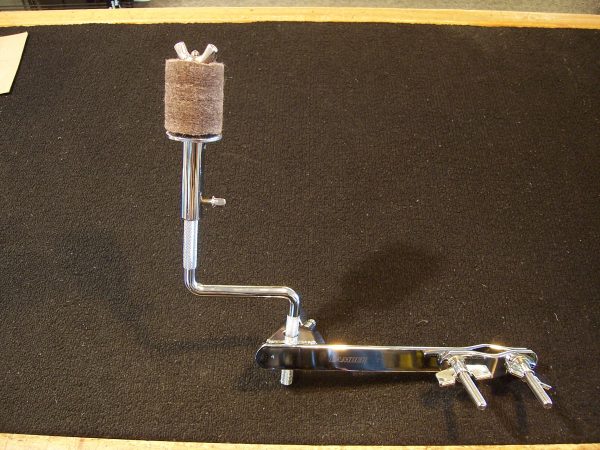 Camber clamp on percussion arm and cymbal holder
