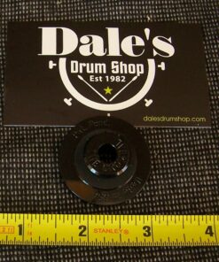 Grombal Model: GRC1-B. round black rubber grommet with hole in center with embossed logo and made in USA at edges. approximately 2 in. diameter