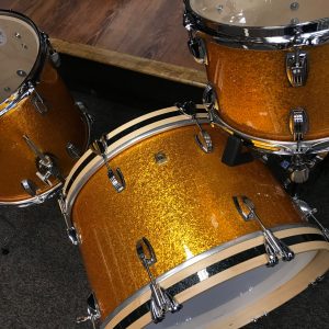 Ludwig Classic Maple Stingray Gold Sparkle three piece Kit With Black Sparkle Bass Hoop Inlays top