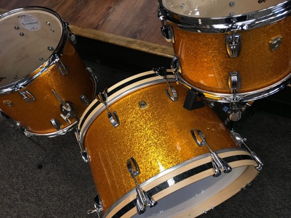 Ludwig Classic Maple Stingray Gold Sparkle three piece Kit With Black Sparkle Bass Hoop Inlays top