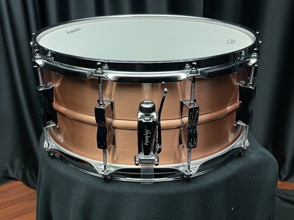 Ludwig brushed copper acro six point five by fourteen inch snare drum throw off