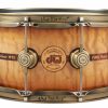 DW 50th Anniversary 6.5x14 Snare Burnt Toast Burst Pre-Order Spruce and Persimmon. laser cut inlays of DW logo and band around center of drum. highly figured finish with lighter center and darker edges. antique bronze appearance on shell hardware.