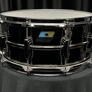 Ludwig Model: LB417K Hammered Black Beauty B-Stock snare drum. black nickel finish with chrome hardware. 6.5 deep x 14 diameter. blue and olive badge.. sminor finish imperfections.