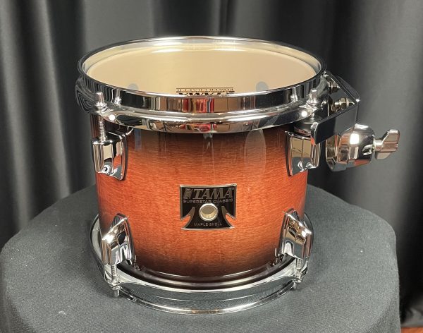 Tama Superstar Classic Maple 8 in. diameter Mahogany Burst lacquer CLT8AMHB mounted tom with suspension mount and chrome hardware. 7 in. depth