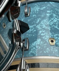 Top view USA Ludwig Stingray set with twelve inch tom fourteen inch floor tom twenty inch bass in Glacier Blue Maple kit showing black sparkle accent bass hoop inlay detail