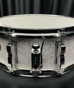 Ludwig Jazz Fest 5.5x14 snare drum in white marine pearl finish. Legacy Mahogany shell. Showing throw off.