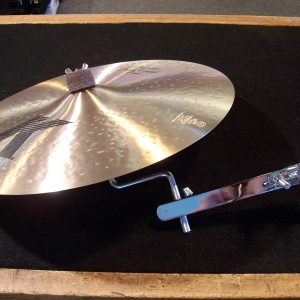 Camber clamp on cymbal holder with cymbal