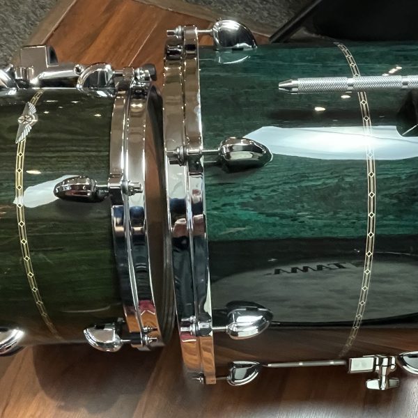 Tama Star Bubinga three piece B stock drum set in Dark Green Cordia showing hue mismatch between twelve inch tom and 14 inch floor tom