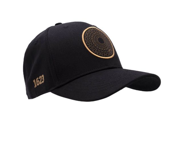 Zildjian 400th Anniversary Black Snapback ball cap three quarter view showing alchemy logo on front of cap and sixteen twenty three embroidered on wearer's right side