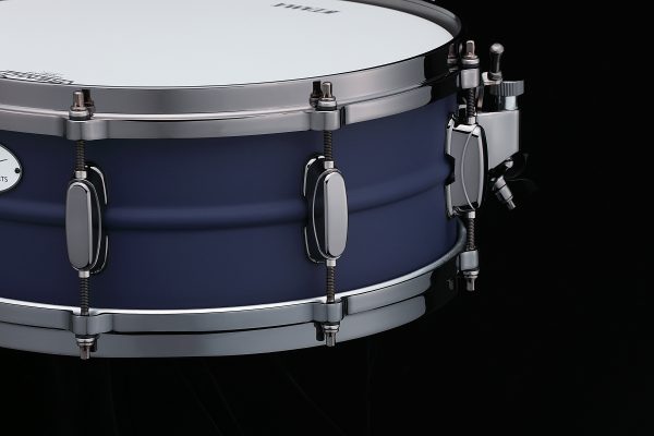 Tama Limited Edition Lil John Roberts snare drum five point five by fourteen inch snare drum only one hundred fifty worldwide deep blue anodized finish with black nickel hardware side view