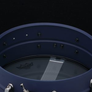 Tama Limited Edition Lil John Roberts snare drum five point five by fourteen inch snare drum only one hundred fifty worldwide deep blue anodized finish with black nickel hardware showing interior of drum