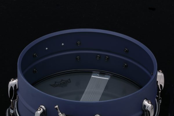 Tama Limited Edition Lil John Roberts snare drum five point five by fourteen inch snare drum only one hundred fifty worldwide deep blue anodized finish with black nickel hardware showing interior of drum
