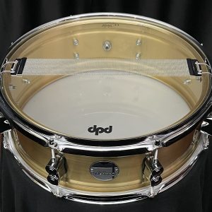 PDP Dual-beaded 1mm Natural Satin Brushed Brass five by fourteen Snare Drum snare side