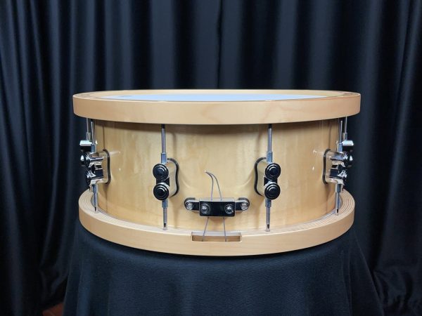 Pacific drum company six point five by fourteen inch concept maple snare drum with maple counterhoops in a natural maple finish snare butt