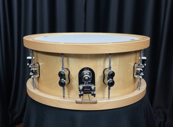 Pacific drum company six point five by fourteen inch concept maple snare drum with maple counterhoops in a natural maple finish mag throw off