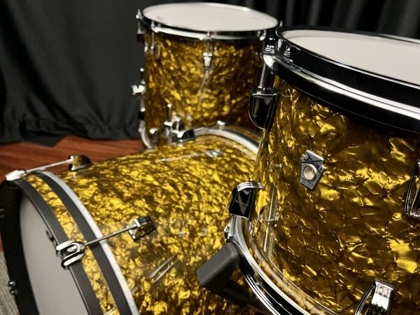 top view of Ludwig butterscotch Pearl Neusonic three piece drum set eight by twelve tom fourteen by fourteen floor tom and fourteen by twenty bass drum