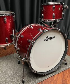 Ludwig U S A red sparkle fab set with thirteen inch tom, sixteen inch floor tom, and twenty two inch bass drum front side view