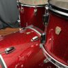 Ludwig U S A red sparkle fab set with thirteen inch tom, sixteen inch floor tom, and twenty two inch bass drum