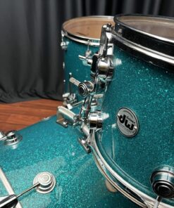 DW Drums Used Collector's Series 3pc Maple Set Teal Glass 5 used dw 3 piece teal glass re wrap collector's set twelve, sixteen, twenty two showing close up of tom on bass