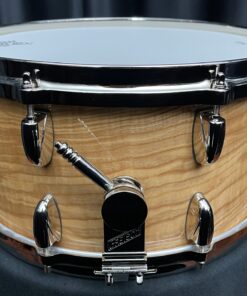 Gretsch USA seven by fourteen inch 140th anniversary snare drum with case showing throw off
