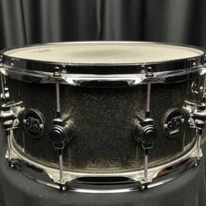 Used DW Performance six point five by fourteen inch pewter sparkle snare drum