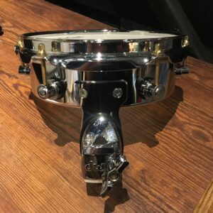 Used DW eight inch chrome steel piccolo tom chrome showing bracket