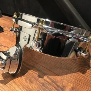 Used DW eight inch chrome steel piccolo tom chrome showing other side