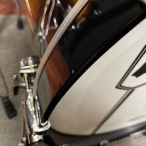Minor Ding on Bass Hoop of Used Mapex Black Panther Velvetone Five Piece Set in Butter Burl Burst Lacquer Finish