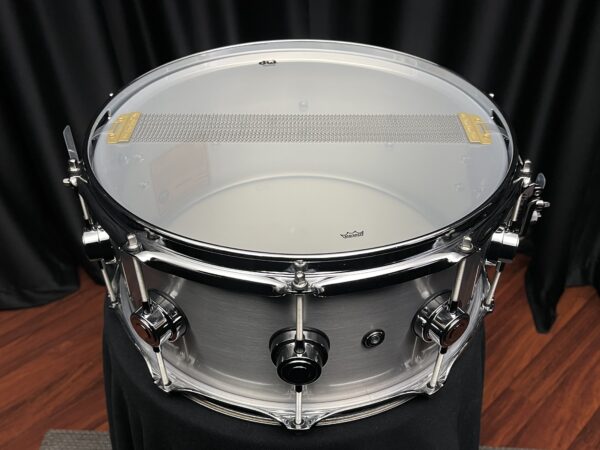 Snare Side of DW Collector's Series 1mm Aluminum Snare Drum six and one half by fourteen