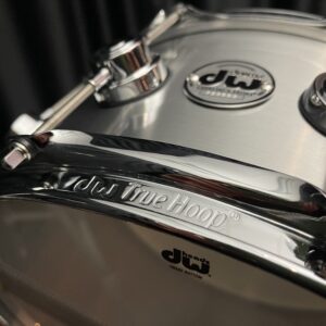 DW Collector's Series 1mm Aluminum Snare Drum six and one half by fourteen badge from bottom