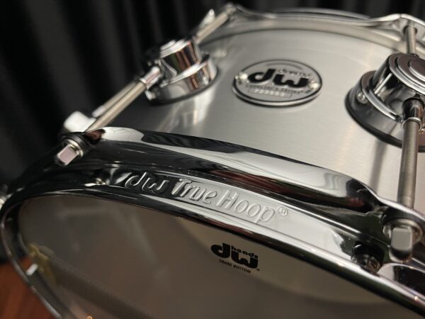 DW Collector's Series 1mm Aluminum Snare Drum six and one half by fourteen badge from bottom