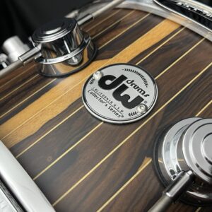 DW Brass Pinstripe Ziracote Limited Snare Drum Badge